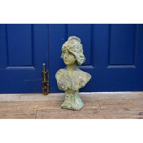 603 - An Art Nouveau design Young Girl's Head with a patinated finish. Measuring: 46cms High.