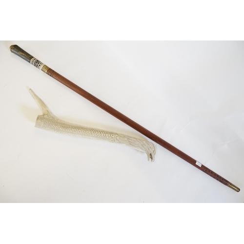 275 - An Indian made Sword Stick with Bone Ferrule along with a Resin Eagle decorated Handle.