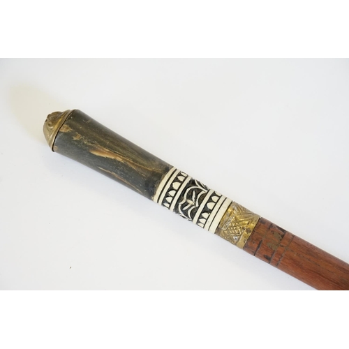 275 - An Indian made Sword Stick with Bone Ferrule along with a Resin Eagle decorated Handle.