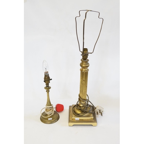 598 - A Brass Corinthian Table Lamp and one other.