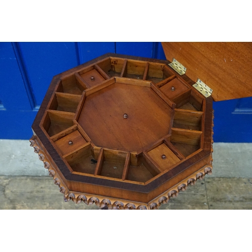 455 - A Victorian Lift-Up Top Needlework Table/Cabinet resting on Carved Paw Feet.