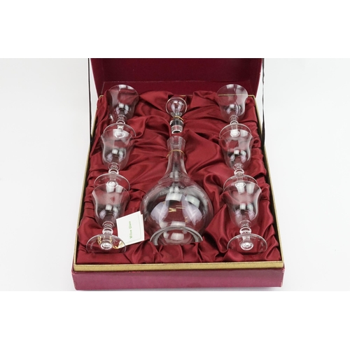 554 - An Engraved Glass Decanter & 6 Sherry Glasses for 