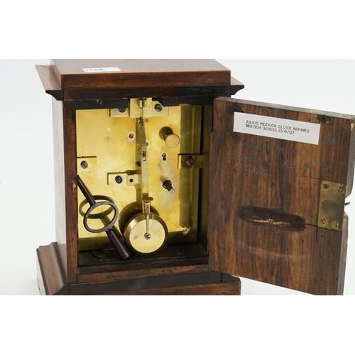 192 - A French Oak Cased Bracket Clock with a movement by 