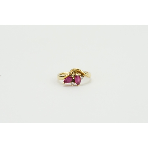 104 - A 18ct ruby and diamond set ring. Weight 3.5g. Size K.