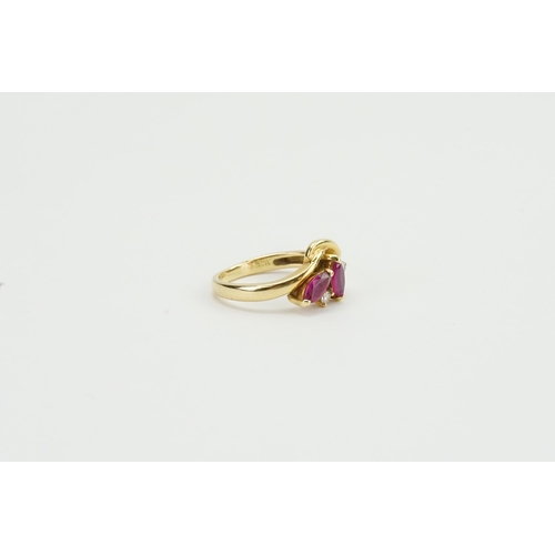 104 - A 18ct ruby and diamond set ring. Weight 3.5g. Size K.