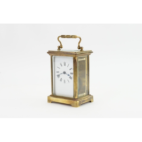 196 - A French Brass Cased Carriage Clock. Measuring: 12cms High.