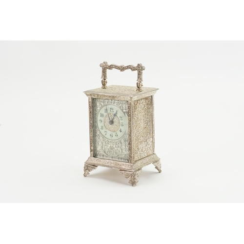 197 - A French Silver Plated & Dye Stamped Carriage Clock with Circular Chaptering with various flowers & ... 