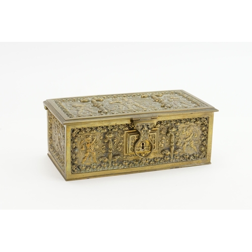 630 - A French Brass Comfrey Box designed with Cupids & Renaissance decoration. Measuring: 21cms x 10cms.