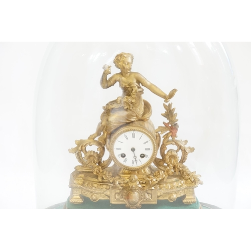 204 - A French Spelter Drawing Room Clock depicting a Young Maiden with garlands of flowers, Floral festoo... 