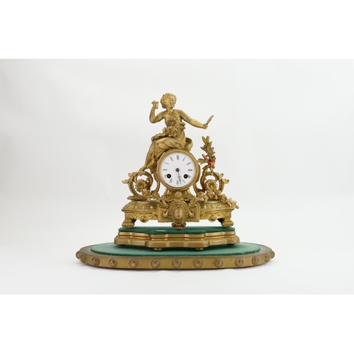 204 - A French Spelter Drawing Room Clock depicting a Young Maiden with garlands of flowers, Floral festoo... 