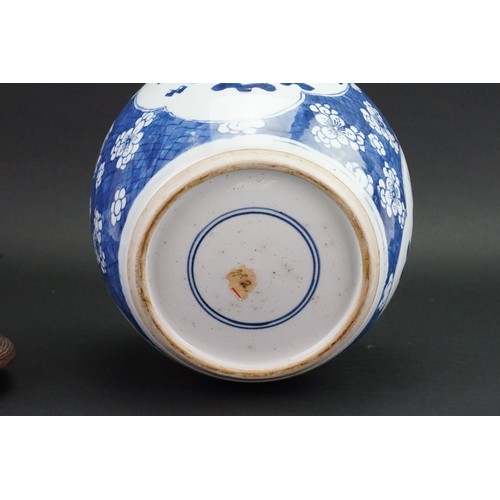 382 - An Antique Blue & White Hawthorn pattern Ginger Jar decorated with precious objects in Cartouche pan... 