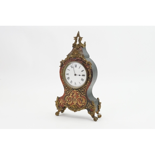 203 - A Late 19th Century French Bulle Clock with cast mounts fitted with a French Drum Movement. Measurin... 