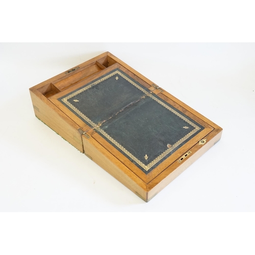 566 - A Victorian Fold Over Top Writing Slope with Brass edges & fitted interior.