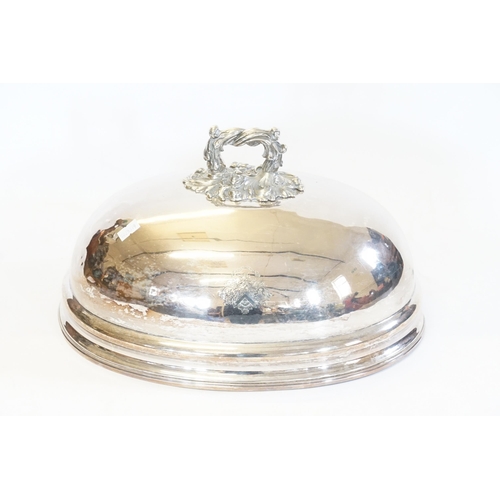 74 - A Silver Plated Entre Dish Cover with an Armorial Crest.