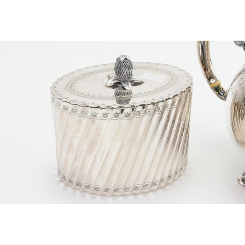 75 - A Victorian Fluted Silver Plated Tea Caddy & a Victorian EPNS Tea Pot.