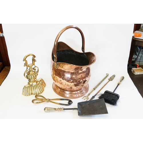 625 - A Cast Brass & Iron Door Stop, an Helmet shaped Coal Scuttle, Shovel, Brush, Tongs, etc.