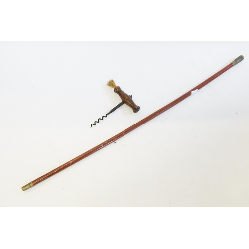 248 - A Clifton Continent Engineers Swagger Stick along with an Antique Cork Screw.