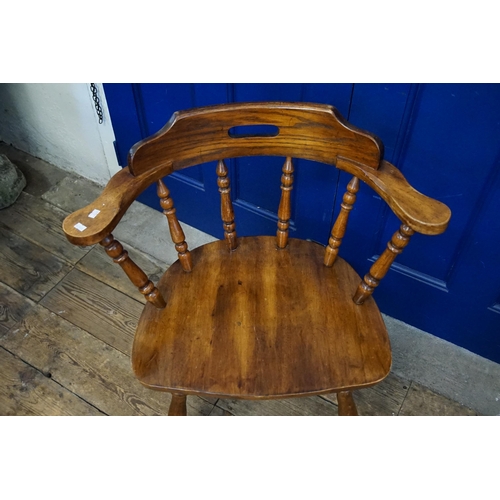 468 - A Bow Elbow Chair resting on Turned Legs & Cross Stretcher.