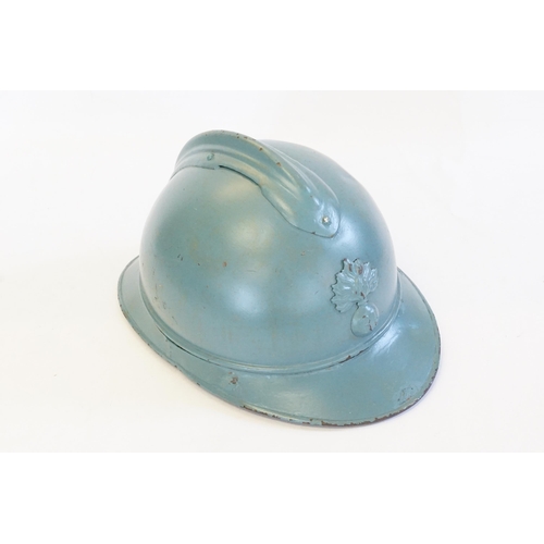 253 - A 1915 French Adrian Helmet in Pale Green refitted.