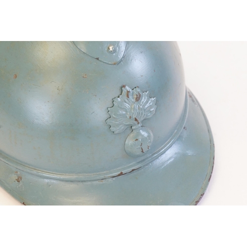 253 - A 1915 French Adrian Helmet in Pale Green refitted.