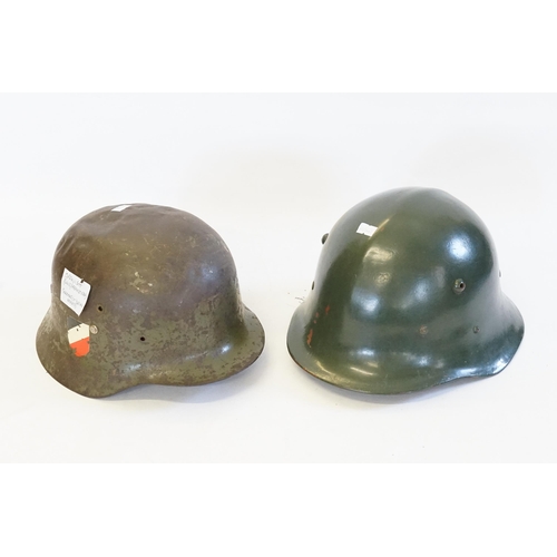 258 - A Spanish Franco Era Helmet with Striped Decoration & one other similar.