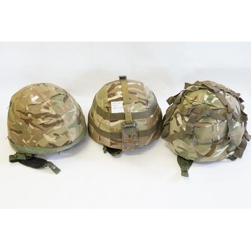 261 - Three British MK7 Helmets with Camouflage Covering.