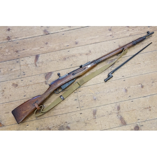 267 - A WW2 Russian M1891 model Mosin-Nagant with Sliding Action Bolt & Bayonet. De-Commission Number to c... 