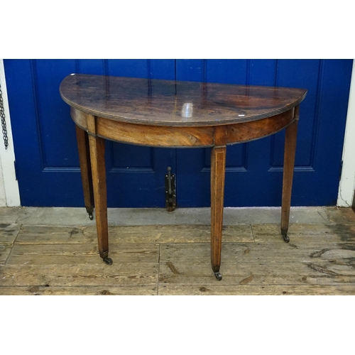 495 - A Victorian Demi-Lume Side Table resting on Shaped Legs & Castors. Measuring: 72cms high x 54cms dee... 