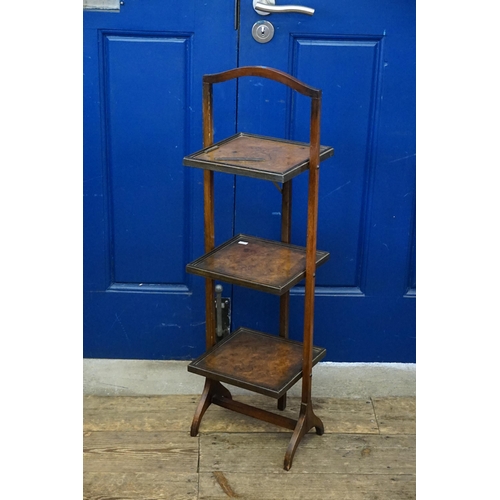 498 - A Walnut veneered Three Tiered Cake Stand.