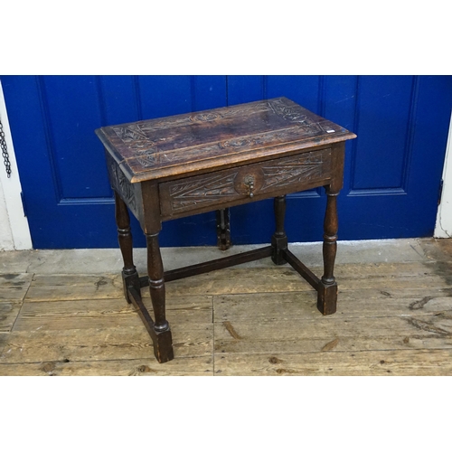 500 - A Jacobean design Single Drawer Side Table resting on Bulbous legs & a Carved Top. Measuring: 68cms ... 