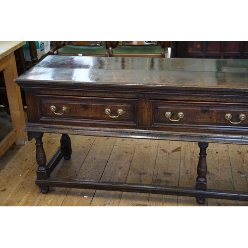 501 - An Antique Oak Dresser fitted with Three Drawers, Brass Swan Neck Handles, Two Plank Top, Turned Leg... 