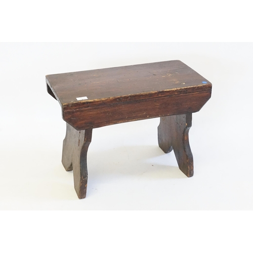 504 - A Boarded Milking Stool resting on shaped legs with a V Cut. Measuring: 33cms across x 17cms deep x ... 