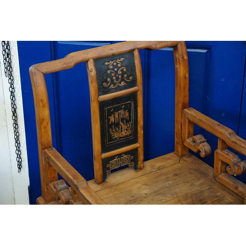 505 - A pair of Chinese open armed chairs, lacquered back decoration, resting on square legs.