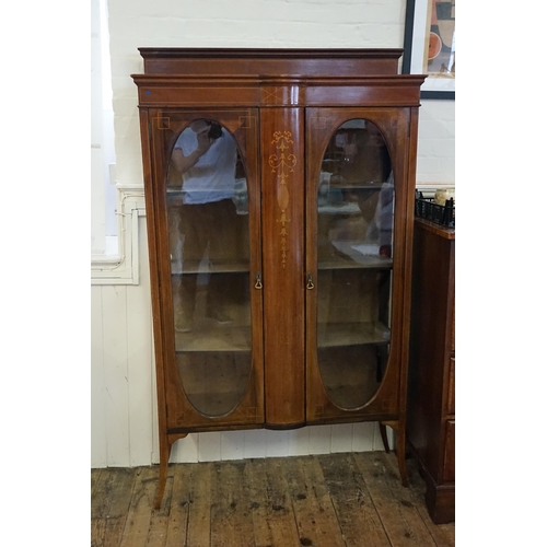 489 - An Edwardian mahogany and line inlaid revival cabinet, central inlaid panel, double door & Resting o... 