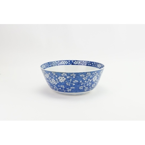 390 - A Chinese blue and white floral decorated large bowl, possibly marked with the four character mark o... 