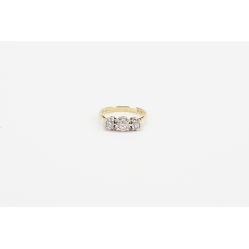 115 - A 18ct gold diamond ring, set with 3 illusion set diamonds. Largest approximately 0.06ct. Size I. We... 