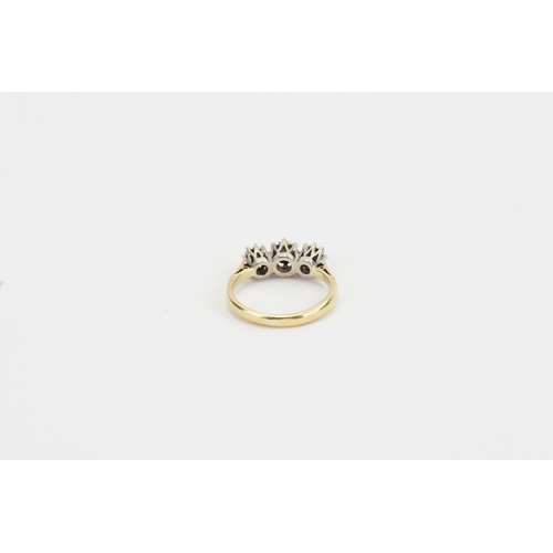 115 - A 18ct gold diamond ring, set with 3 illusion set diamonds. Largest approximately 0.06ct. Size I. We... 