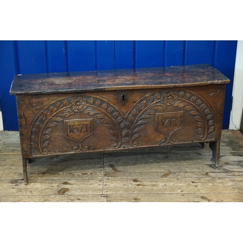 475 - An Antique Oak Single Panelled Coffer resting on a 