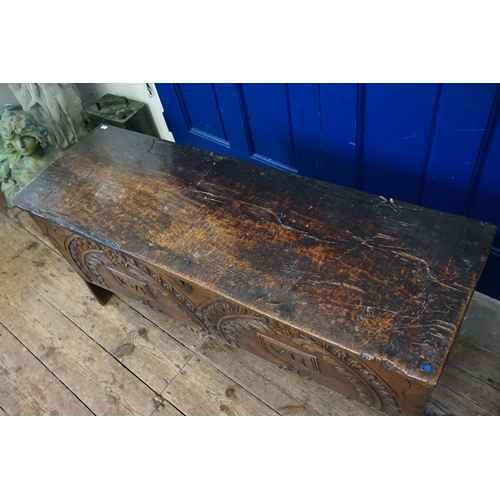 475 - An Antique Oak Single Panelled Coffer resting on a 