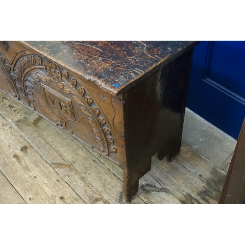 475 - An Antique Oak Single Panelled Coffer resting on a 