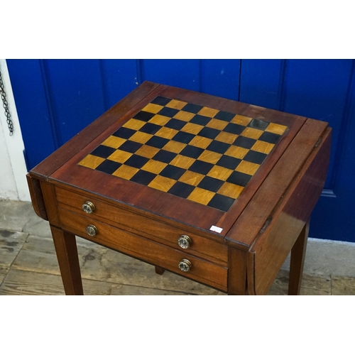 478 - A Reproduction Mahogany Sliding Top Tow Drawers Games Table with a Chess Top & Backgammon resting on... 