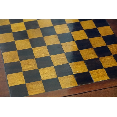 478 - A Reproduction Mahogany Sliding Top Tow Drawers Games Table with a Chess Top & Backgammon resting on... 