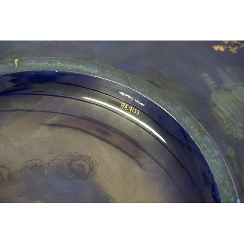 355 - A Blue Glazed Gold Burnished Floral decorated Centre Bowl. Measuring: 38cms across. Along with Three... 