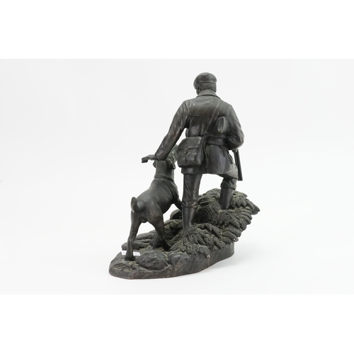 620 - A Study of a Huntsman with a Flat Cloth Cap & a Dog. Measuring: 20cms high.