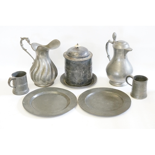 623 - A Pair of Georgian Pewter Plates, two Pewter mugs, a French Beer Jug, Biscuit Barrel & an Italian Wa... 