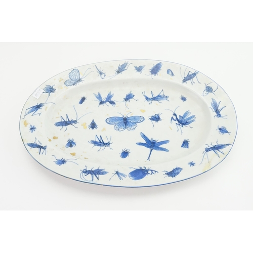 394 - A Japanese Hiraldo Plate decorated with Stag Beatles, Locusts, etc. (AF). Measuring: 38cms.