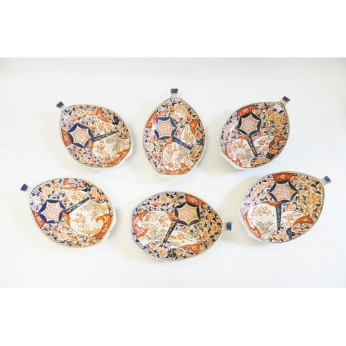 404 - Six Japanese Imari pattern Boat Shaped Dishes decorated in Rust, Blue & Cream, signed.