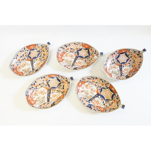 407 - Five Japanese Imari pattern Boat Shaped Saucer Dishes decorated in Rust, Blue & Cream, signed.