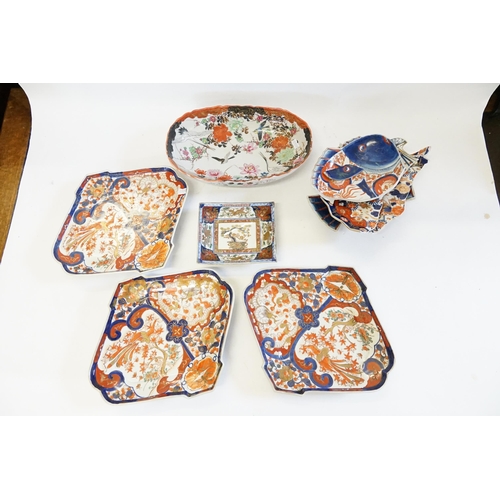 409 - Three Japanese Imari pattern Serving Platters decorated in Rust, Blue & Cream, signed. Along with a ... 