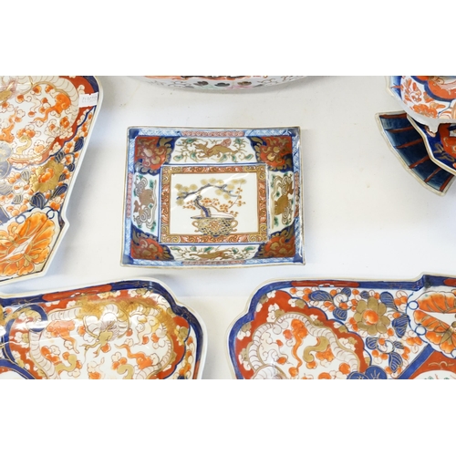 409 - Three Japanese Imari pattern Serving Platters decorated in Rust, Blue & Cream, signed. Along with a ... 